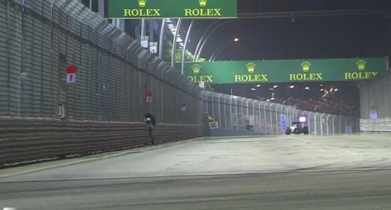 Illustration for article titled Random Fan Walks On Track During F1 RaceÂ